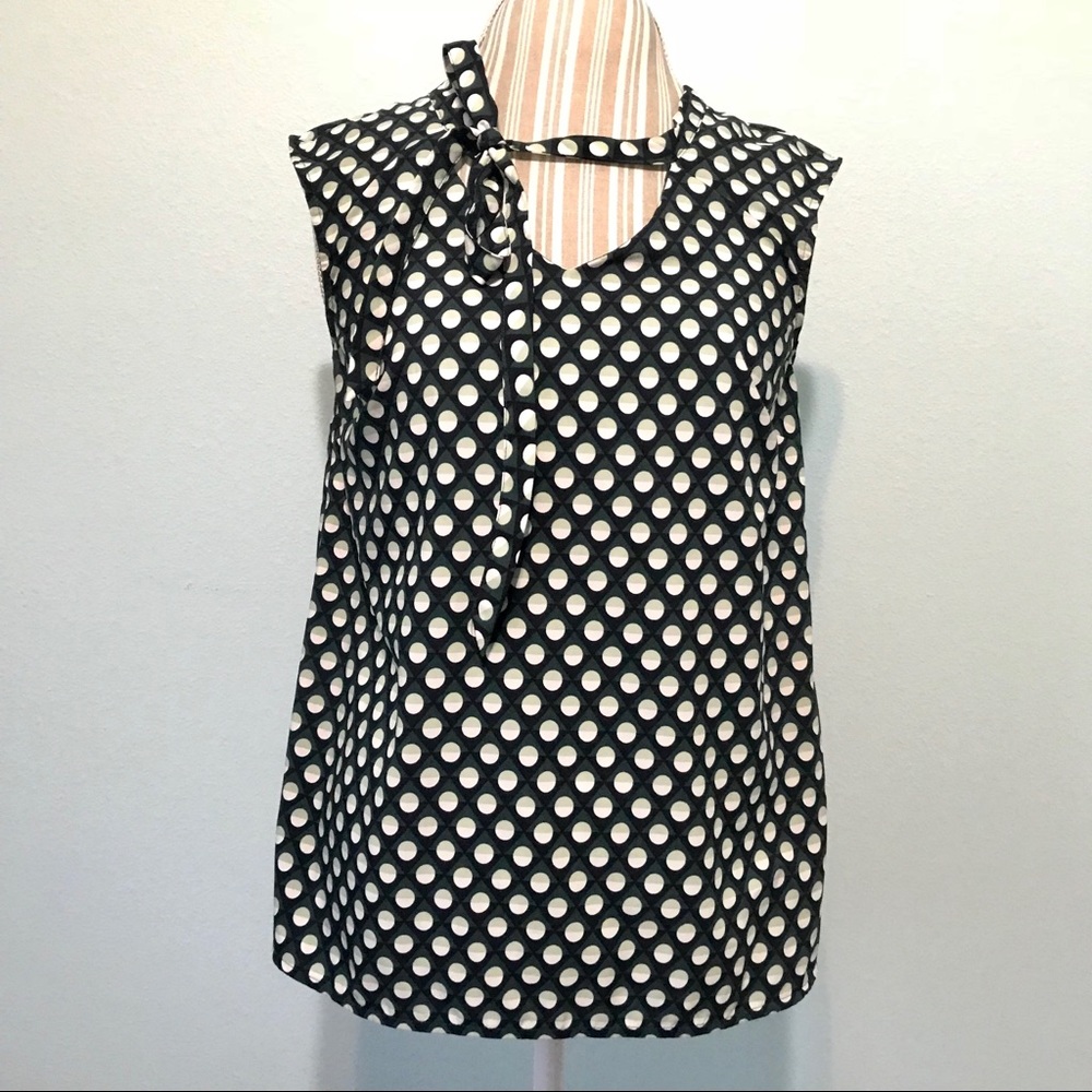 Sleeveless dress top with tie detail